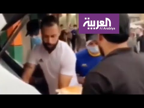 شاهد لاعبون عراقيون يقدّمون المساعدة للمتظاهرين في ساحة التحرير